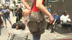 San Francisco Board of Supervisors candidate George Davis stripped naked in Times Square on Wednesday to campaign for the right to be nude in public. (Aug. 6) News Clip