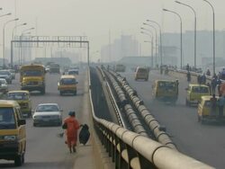 MS Shot of freeway with pedestrian coming / Lagos, Nigeria Stock Footage