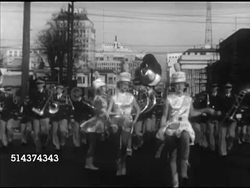 1952: SECRETARY OF THE INTERIOR: MS Title, WS Parade in street w/ majorettes & band, MS Douglas McKay (1893-1959) smiling, taking off hat. WS Parade w/ police marching, WS McKay riding in convertible waving hat, smiling (poor contrast). Instructional Video