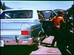 Family trip through a national park in a Rambler Stock Footage