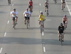 WS Bike traffic on Lake Shore Drive in Chicago on summer morning during community cycling event / Chicago, Illinois, USA Stock Footage