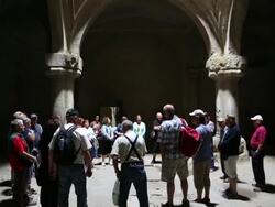 Geghard monastery, tourists in a church Stock Footage
