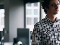 MS TU R/F Businessman standing in high tech office smiling/Washington, USA Stock Footage