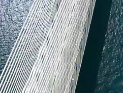 MS AERIAL Shot of Rio-Antirrio bridge with cars passing on bridge / Rio, Peloponnese, Greece Stock Footage