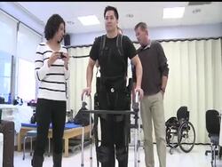 A paralyzed architect describes his experience using an exoskeletal device that allows individuals with paralysis to stand and walk. The device, now being tested in New York, may soon be used in rehabilitation centers across the United States. News Clip