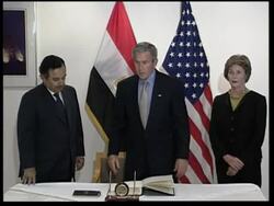 Bush signs book of condolences for victims News Clip