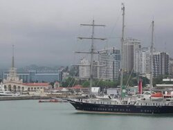cruise sailing ship enters the port of Sochi Stock Footage
