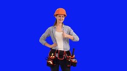 beautiful young girl builder shows a copy space Stock Footage