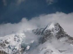 T/L clouds over Tolma peak, India Stock Footage