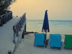 Beach Chairs With Sunset View Stock Footage