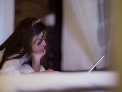 Woman using laptop computer Stock Footage