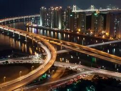 WS T/L View of Night Scenery Gwangandaegyo bridge in Haeundae / Busan, Busan, South Korea Stock Footage