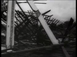 B/W 1960's PAN of ruins of destroyed village / Vietnam / SOUND Stock Footage