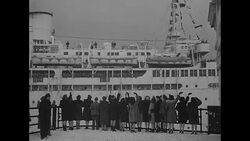 Former luxury liner USAT Saturnia arrives in New York Harbor, bearing stranded GIs from SS Henry Ward Beecher News Clip