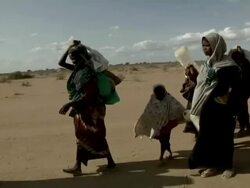 Refugee family arriving at refugee camp Stock Footage