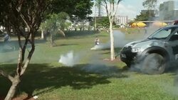 Violent clashes as police confront protesters outside stadium News Clip