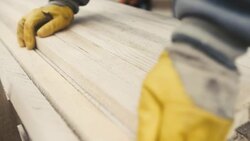 Man working with wood at sawmill Stock Footage