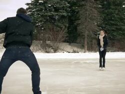Young adult couple skating together. Stock Footage