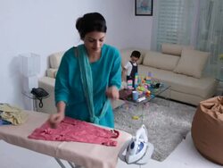 Woman Ironing clothes  Stock Footage