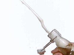 CU SLO MO Hand opening bottle of beer and beer Splashing / Vieux, Normandy, France    Stock Footage