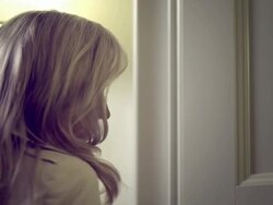 Sexy woman opens door Stock Footage