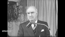 American Federation of Musicians President James C Petrillo announces the union's weekly payment to unemployed blind members. News Clip