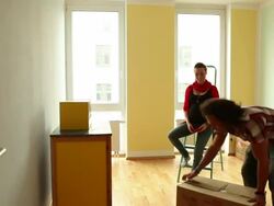 Moving the commode Stock Footage