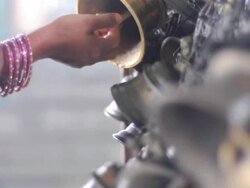Indian lady is ringing bell Stock Footage