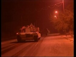 GWT: US tanks patrolling capital at night News Clip