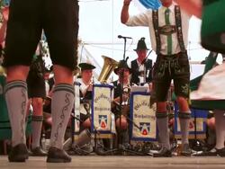 SLO MO Traditional Bavarian Schuhplattler dance performed in a beer tent Stock Footage