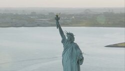 'MS DS AERIAL Shot of Statue Of Liberty / New York City, United States ' Stock Footage
