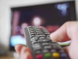 Remote control to transform television channels Stock Footage