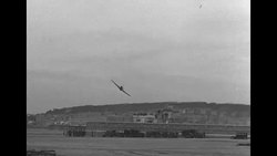 British civilians watching weaponry demonstration during WWII News Clip