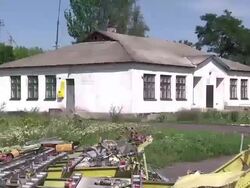 MH17 crash debris in by residential buildings News Clip