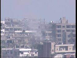 WRAP Sound of explosions heard, smoke rising ADDS fire, smoke News Clip