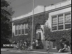 1944: USA: Steeple. People leaving church. VS Houses. EXT School. Street scene w/ men on sidewalk, car parking curbside. EXT Synagogue. NEWSPAPER: Vandals Smear Jewish Temple. EXT St. Patrick's Cathedral. NEWSPAPER: Vandals Deface ST. Patrick's. Instructional Video