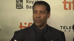 EXCLUSIVE INTERVIEW: Denzel Washington reveals why he like working with Antoine Fuqua at Toronto International Film Festival 2016 Stock Footage