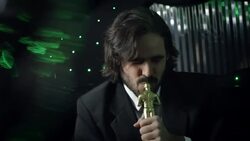 Excited celebrity kisses Oscar statuette in backseat of limousine at awards show Stock Footage