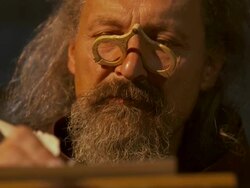 HD DOLLY: Monk Scribing Text With A Quill Pen Stock Footage