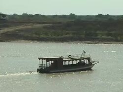 Moving Shot Small Boat Passing in Tonlesap Lake Siem Reap Cambodia Stock Footage