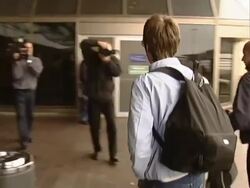Liam and Noel Gallagher fly out from Heathrow Stock Footage