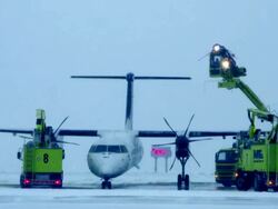 A small plane being de-iced Stock Footage