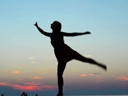 HD: Young women dancing classic ballet against the sunset Stock Footage