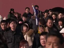 Mao portrait and crowds in Tiananmen Square News Clip