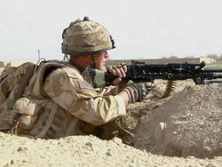 MS Soldier taking position with rifle for war / Musa Qala, Helmand Province, Afghanistan. Stock Footage