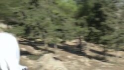 CLEAN : Army escort helps Palestinian pupils run News Clip