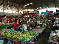 WS Shot of vegetables traders and customers in market / Vientiane, Laos Stock Footage