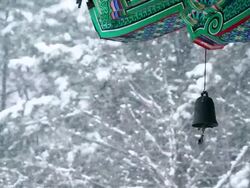 MS Snow Scene of Choamsa( Old Buddhist temple at Yeongju) and fish shaped bell / Yeongju, Gyeongsangbuk do, South Korea Stock Footage
