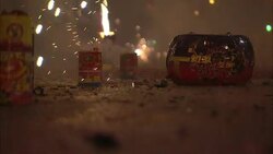 Fireworks spark and sizzle on a street in Beijing. Stock Footage