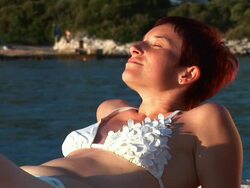 HD: Relaxing On The Beach Stock Footage